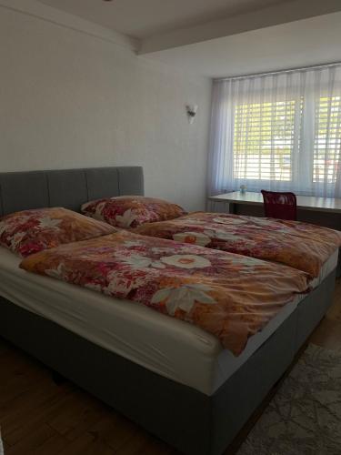 מיטה או מיטות בחדר ב-Ferienwohnung Deti