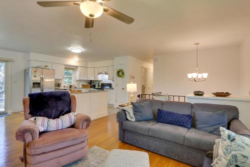 a living room with a couch and two chairs at Kiamesha Lake Home with Deck 4 Mi to Resorts World! in Monticello