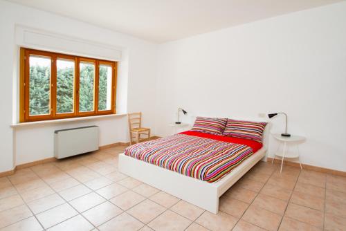 Postel nebo postele na pokoji v ubytování Villa del Parco