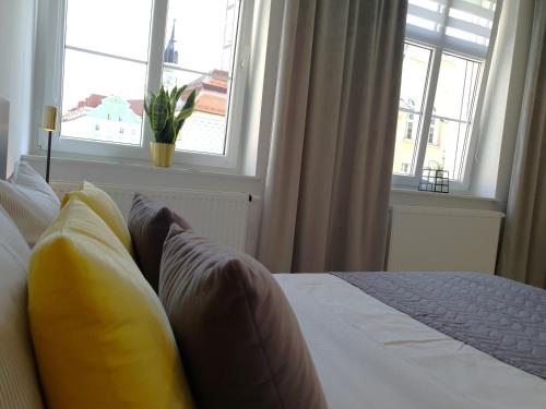 Ένα ή περισσότερα κρεβάτια σε δωμάτιο στο Apartament Przy Starówce - Zoni