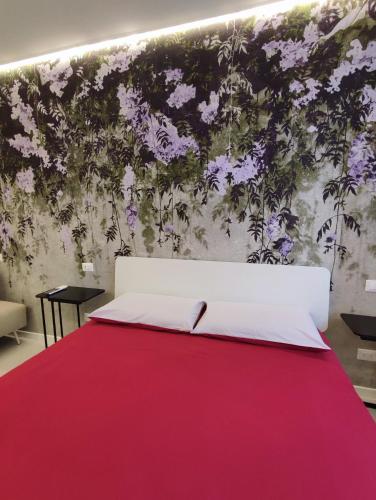 Ένα ή περισσότερα κρεβάτια σε δωμάτιο στο AL PONTE design apartment