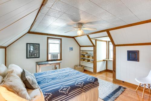 a bedroom with a bed and a couch in a room at Cape May Vacation Rental about 3 Mi to Beach and Mall! in Cape May