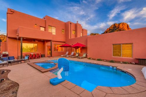 a house with a swimming pool in front of it at Sedona Family Vacation in Sedona