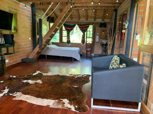 TV a/nebo společenská místnost v ubytování Rancheria Loft Chalet, lago privado