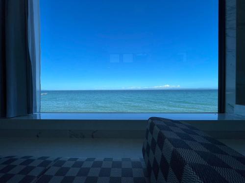 a view of the ocean from a window at Haon Terrace Suite Villa Ango - Vacation STAY 30531v in Sumoto
