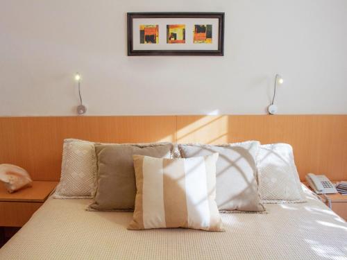 Postel nebo postele na pokoji v ubytování Hotel Ajax