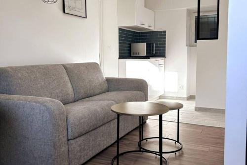 Χώρος καθιστικού στο Cosy home proche de Roissy CDG PARIS, Parc Astérix I Aéroville I Parc des Expo I Villepinte