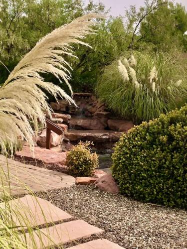 a garden with some long grass and some stairs at ULTIMATE Mountain Escape with Pool & Hot Tub & Firepit in Sedona