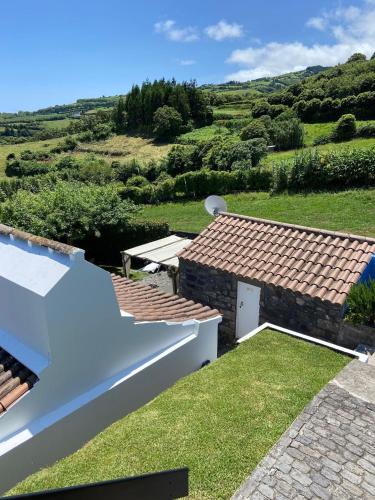 a view of the garden from the roof of a house at Home Near the Clouds - Refúgio in Nordeste