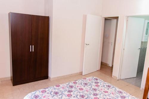 Ένα ή περισσότερα κρεβάτια σε δωμάτιο στο Cabañas Susurros del Río