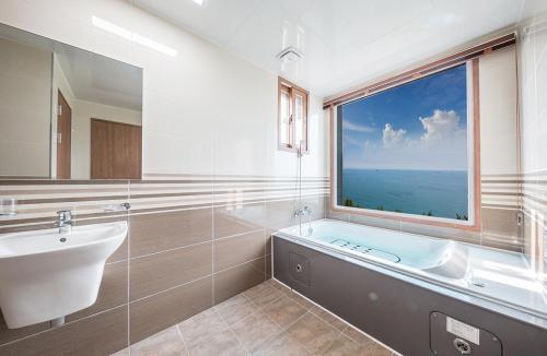 Koupelna v ubytování Aria Pension & Resort