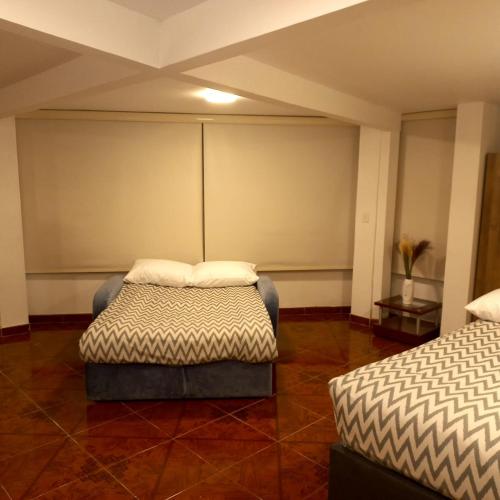 Ένα ή περισσότερα κρεβάτια σε δωμάτιο στο CASA AVILA - Apartamento amoblado 4 - Villa Alsacia