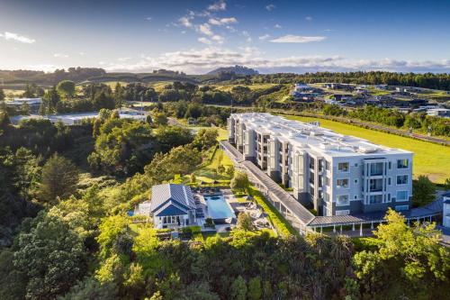 an aerial view of a large white building at Hilton Lake Taupo in Taupo