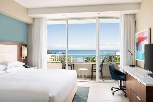 Postel nebo postele na pokoji v ubytování Caribe Hilton