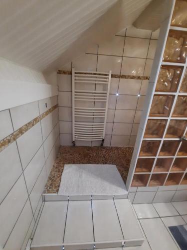 Koupelna v ubytování Chambre Spacieuse RER A