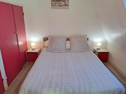 En eller flere senge i et værelse på Cottage, Beuzec Cap Sizun
