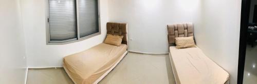 Cama ou camas em um quarto em Luxury Appartment in Hassan tour