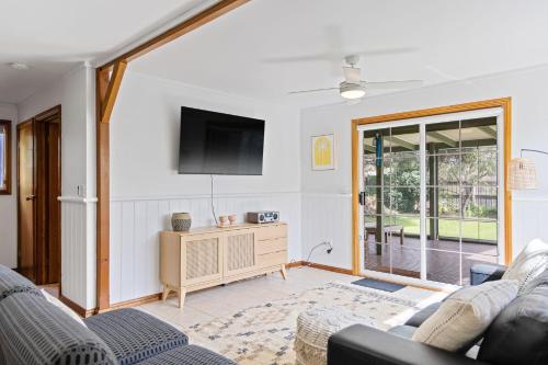 TV a/nebo společenská místnost v ubytování Cape Cottage