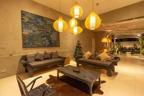 Khu vực ghế ngồi tại Canggu garden family villa, short walk to the Beach