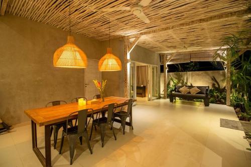 Khu vực ghế ngồi tại Canggu garden family villa, short walk to the Beach