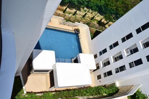 an overhead view of a building with a swimming pool at Consuelo Boracay Unit Rental in Boracay
