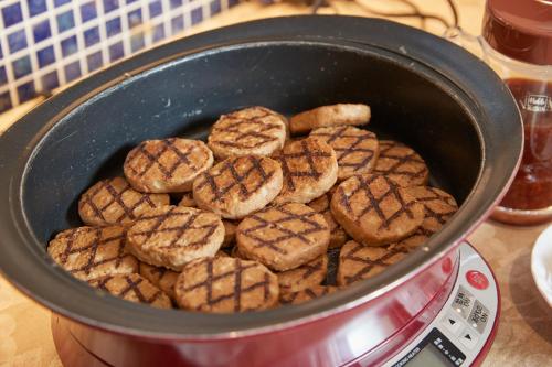 a bunch of cookies in a pot on a stove at RJ Hotel Naha in Naha