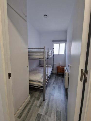 Postel nebo postele na pokoji v ubytování Apartamentos daurada calafell