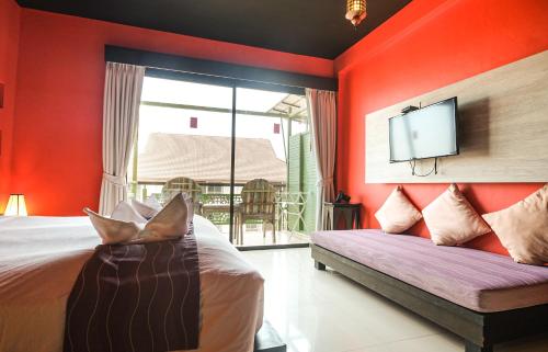 Una cama o camas en una habitación de Bhundhari Chaweng Beach Resort Koh Samui - SHA Plus
