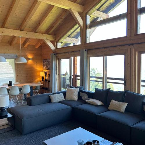 Be Cool SAUNA & LUXURY chalet 10 pers by Alpvision Résidencesにあるシーティングエリア