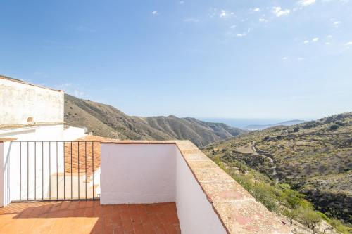 a balcony with a view of the mountains at Zarzamora de Rubite in Rubite