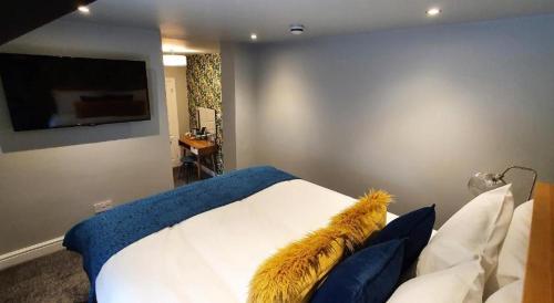 Ένα ή περισσότερα κρεβάτια σε δωμάτιο στο The George Country Inn, Wath