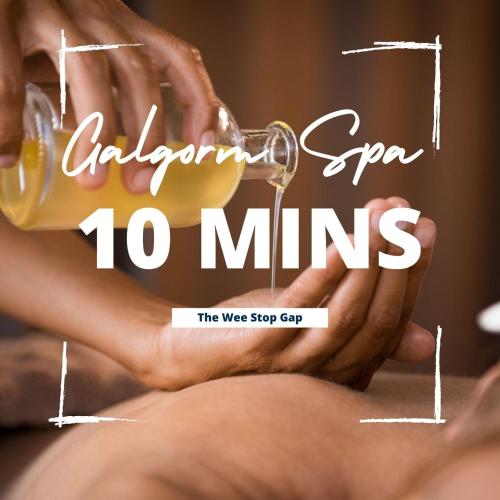 a poster for a spa mins with a glass of beer at 3 Bedroom Apartment, Ballymena, The Wee Stop Gap in Ballymena