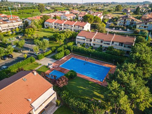 an overhead view of a house with a swimming pool at il lauro apartment in Lazise