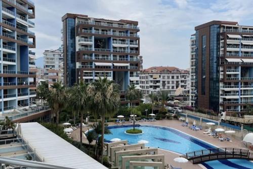 Výhled na bazén z ubytování Первоклассная квартира в Алании nebo okolí