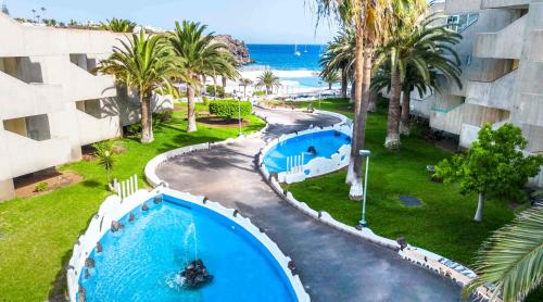 an aerial view of a swimming pool at a resort at Ona Alborada in Costa Del Silencio