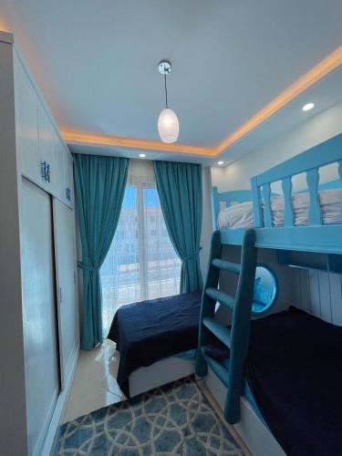 Postel nebo postele na pokoji v ubytování Sharm Hills Aqua park Resort شرم هيلز اكوا بارك ريزورت