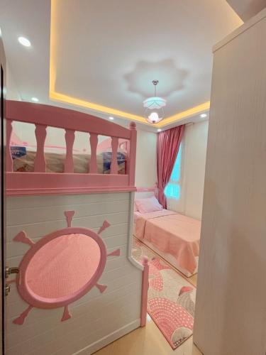 Postel nebo postele na pokoji v ubytování Sharm Hills Aqua park Resort شرم هيلز اكوا بارك ريزورت