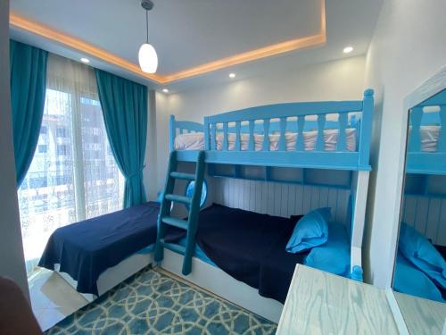 Postel nebo postele na pokoji v ubytování Sharm Hills Aqua park Resort شرم هيلز اكوا بارك ريزورت