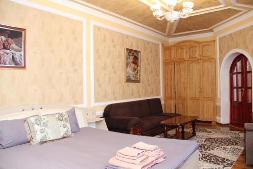 Ένα ή περισσότερα κρεβάτια σε δωμάτιο στο BEST GUESTHOUSE