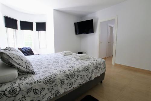 Katil atau katil-katil dalam bilik di TESS Villa Jocalo