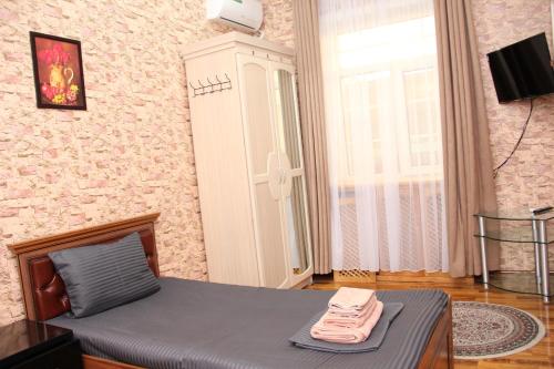 Μια τηλεόραση ή/και κέντρο ψυχαγωγίας στο BEST GUESTHOUSE