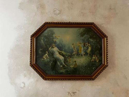 a picture of a painting on a wall at Gut Manderow an der Ostsee in Hohenkirchen