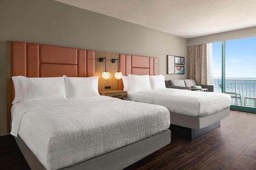 Ένα ή περισσότερα κρεβάτια σε δωμάτιο στο Hampton Inn Virginia Beach-Oceanfront South