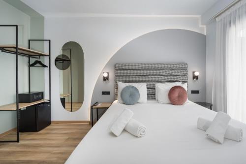 Posteľ alebo postele v izbe v ubytovaní Centro Hotel Ioannina