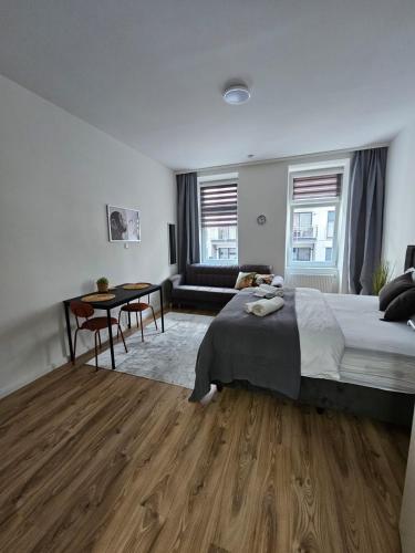 Posteľ alebo postele v izbe v ubytovaní Cozy Core Vienna 10 min to Center