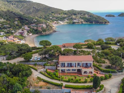 an aerial view of a house with a beach at Apartment Turistica-2 by Interhome in Capoliveri