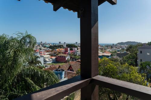 a view of the city from the balcony of a building at Pousada Albacora in Bombinhas