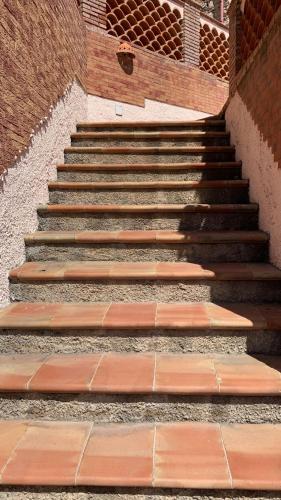 a set of stairs in a building at Isola Bella - Rooms il Pescatore in Taormina