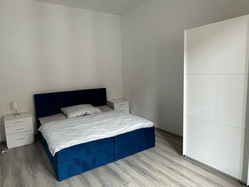 Un ou plusieurs lits dans un hébergement de l'établissement NO 21 Apartment I Košice