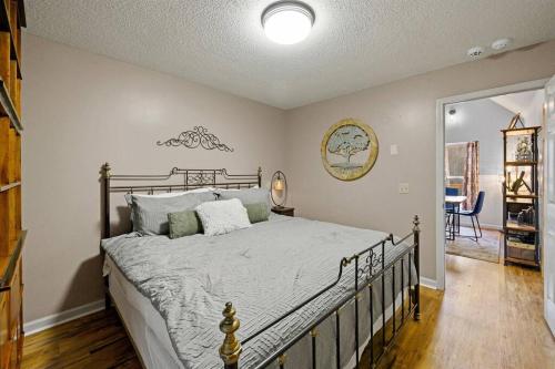 a bedroom with a large bed in a room at Secluded Cabin / Stunning Mtn View / Paved Drive in Sevierville